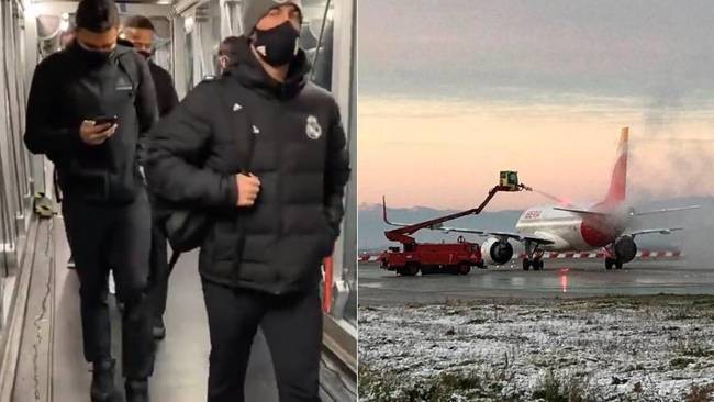 Các cầu thủ Real Madird rời máy bay sau hơn 4 giờ mắc kẹt vì bão tuyết.