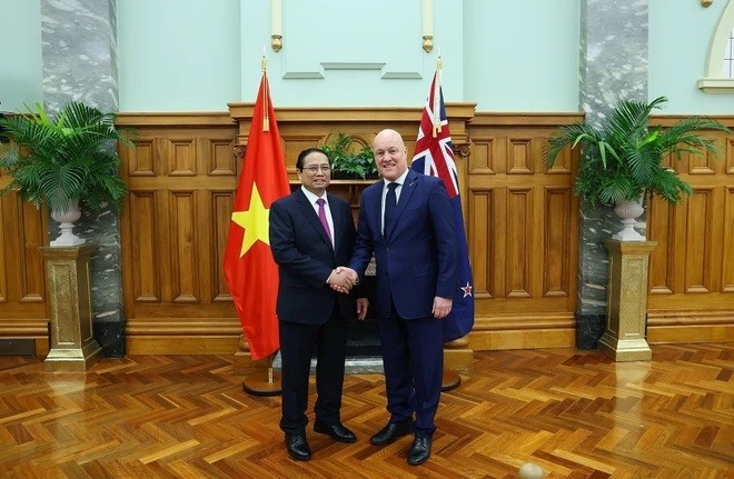 Thủ tướng Phạm Minh Chính với Thủ tướng New Zealand Christopher Luxon. (Ảnh: Dương Giang/TTXVN)