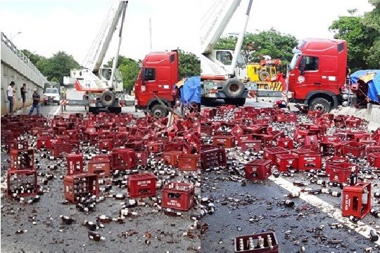 Thanh Hóa: Xe đầu kéo chở bia nổ lốp, hàng trăm két bia vỡ tung tóe trên quốc lộ