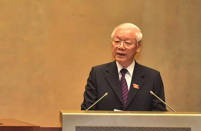 Tổng Bí thư, Chủ tịch nước Nguyễn Phú Trọng trình bày Tờ trình về việc đề nghị Quốc hội phê chuẩn Hiệp định CPTPP (Ảnh: Lâm Hiển)