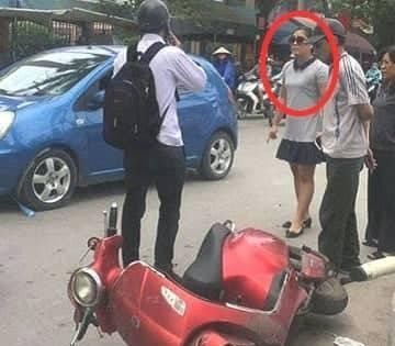 Hình ảnh được cắt từ clip hiện trường vụ va chạm giữa nữ tài xế và nam sinh viên. Ảnh: Facebook