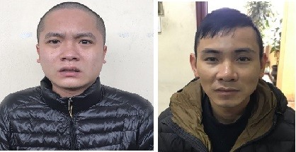 Hai đối tượng Đàm Văn Bình và Nguyễn Vũ Huy tại cơ quan điều tra, ảnh: QTV