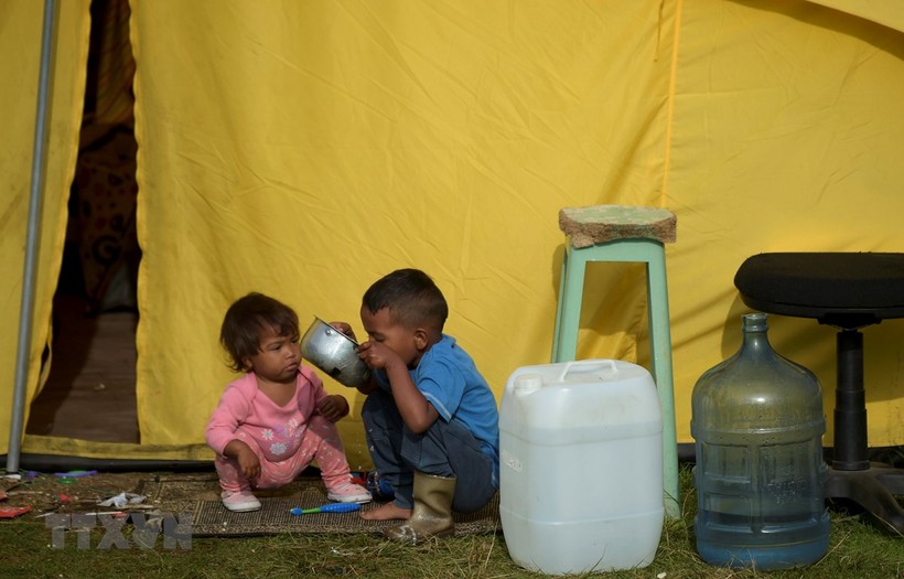 Trẻ em tị nạn Venezuela tại lều tạm ở Bogota, Colombia, ngày 9/1/2019. (Ảnh: AFP/TTXVN).