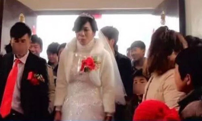 Đám cưới của Wang và “cô dâu” Miao Songtao.