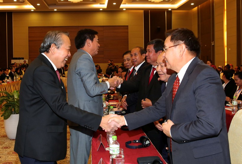 Phó Thủ tướng Thường trực Chính phủ Trương Hòa Bình cùng các đại biểu dự hội thảo. Ảnh VGP/Lê Sơn