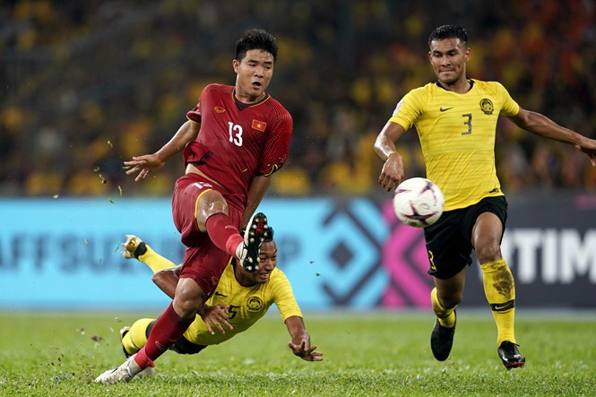 Malaysia (áo vàng) đang sáng cửa để vào vòng sơ loại thứ 2 World Cup 2022 khu vực châu Á